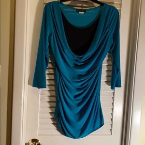 A classy teal blouse by American city wear
